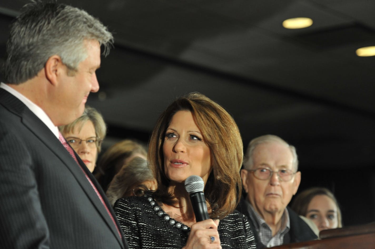 Rep. Michele Bachmann, R-Minn. announces that she will end her campaign for president, Wednesday, Jan. 4, 2012, in West Des Moines, Iowa, with husband Marcus and other family members.