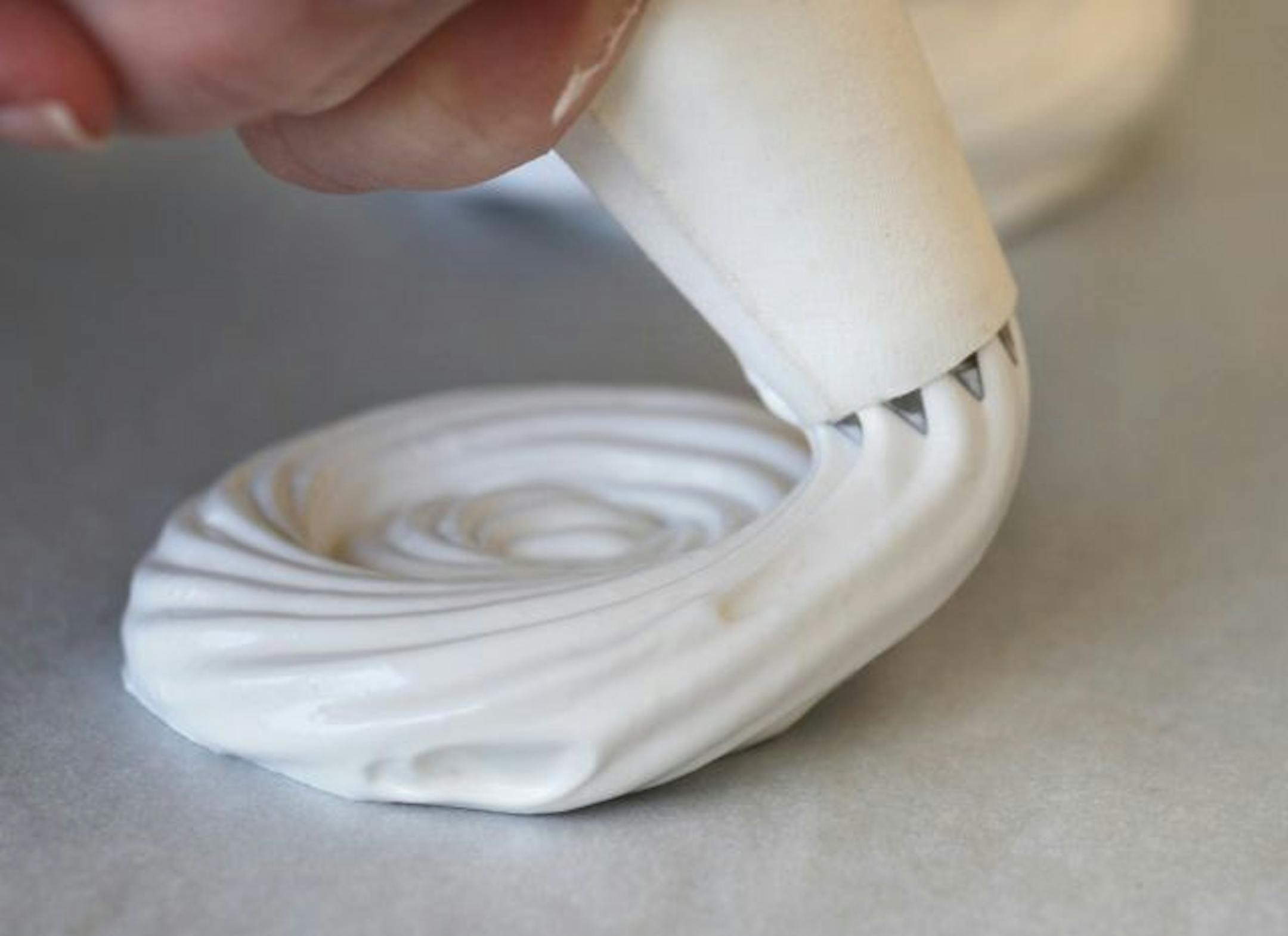 The meringue nests can be formed with a pastry bag or simply with a spoon.