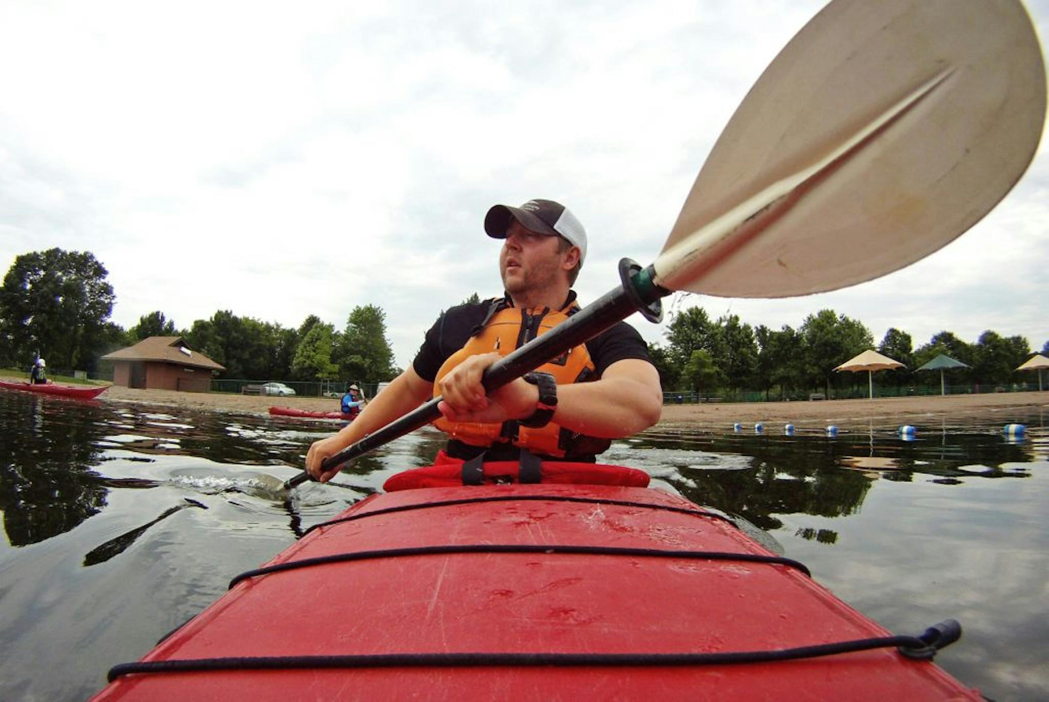 Outdoor recreation specialist Dan Fjell teaches kayaking at lakes throughout Three Rivers Park District.