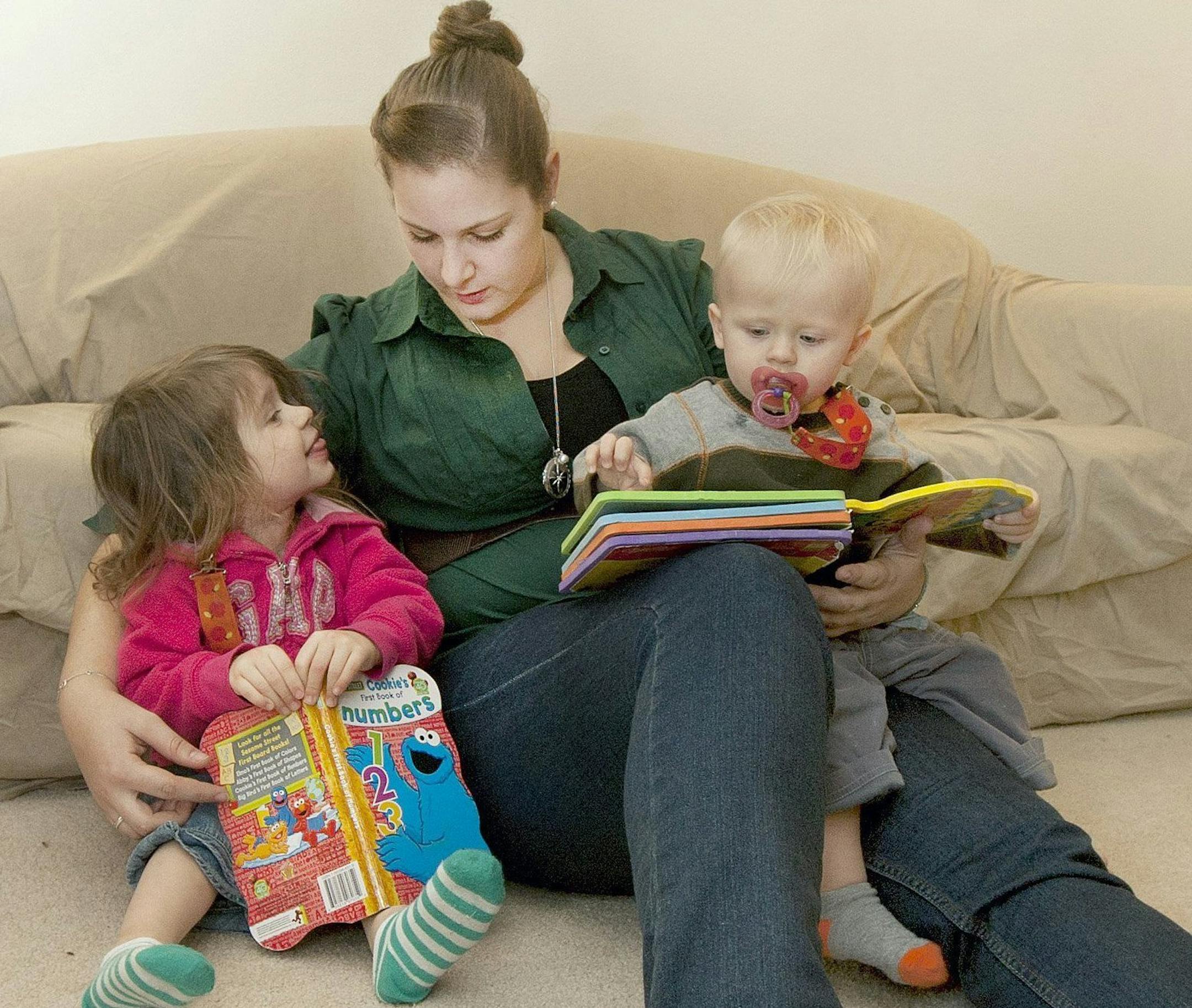 Melanie Bargfeldt is an au pair from Germany taking care of Ella and William Edwards at the Edwards' family home in Cummings, N.D., on Dec. 6, 2013. (John Stennes/Grand Forks Herald/MCT) ORG XMIT: 1146985