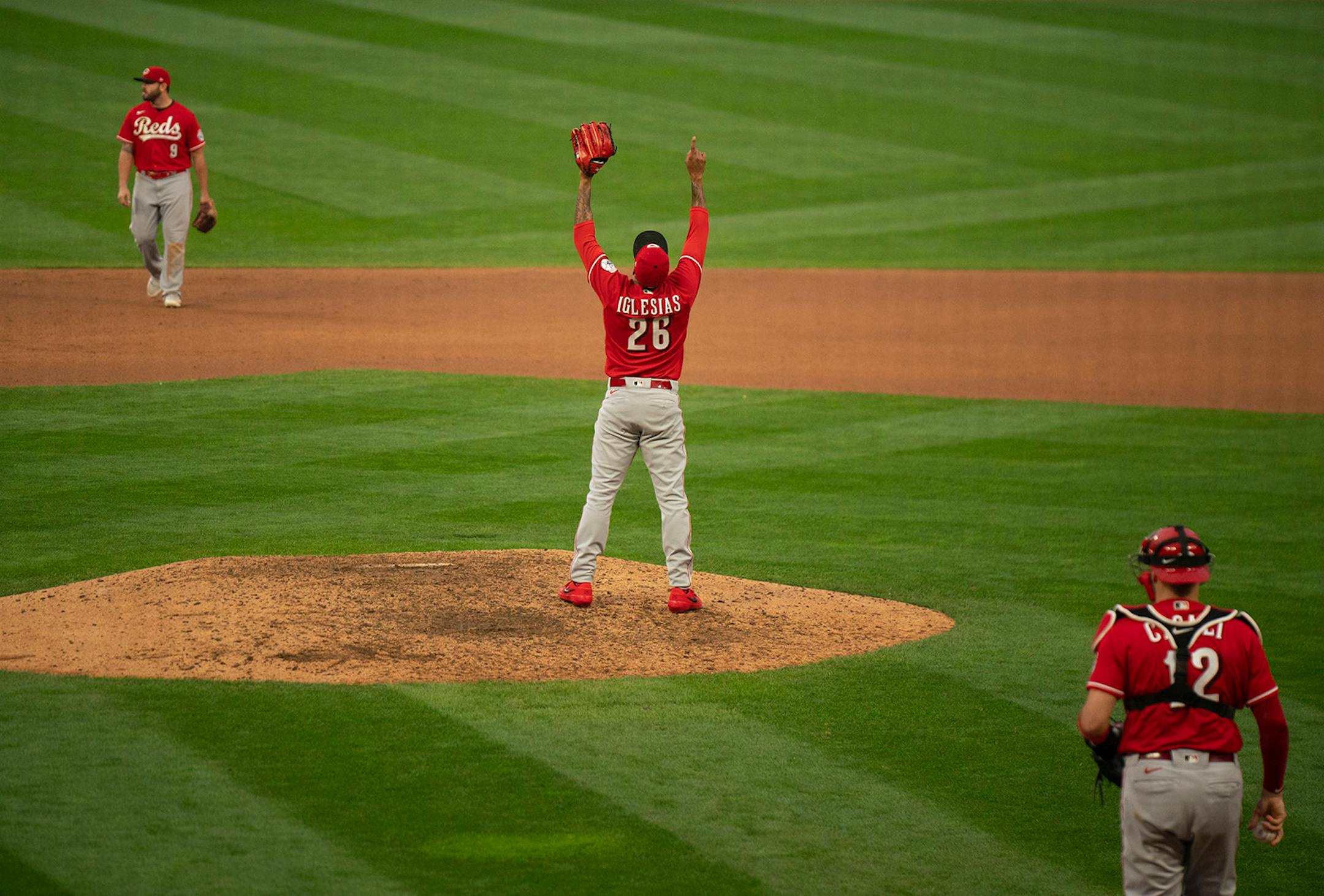 Cincinnati Reds relief pitcher Raisel Iglesias (26) celebrated the team�s win over the Twins.