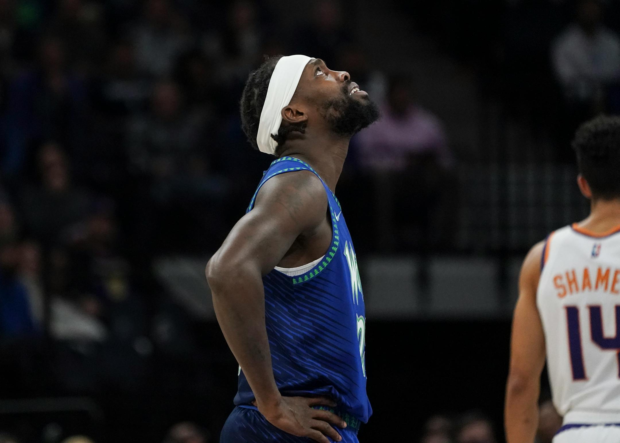 Minnesota Timberwolves guard Patrick Beverley (22) looks up to watch a replay after fouling in the fourth quarter.