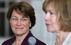 U.S. Senator Amy Klobuchar listened as Minnesota Lt. Gov. Tina Smith discussed details of an upcoming trade mission to Cuba. ] Shari L. Gross &#xef; s