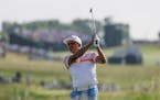 Rickie Fowler hits on the 12th hole during the first round of the U.S. Open golf tournament Thursday, June 15, 2017, at Erin Hills in Erin, Wis. (AP P