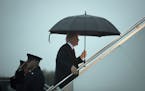 President Donald Trump boards Air Force One in Middletown, Pa., after speaking on tax reform in Harrisburg on Oct. 11, 2017. Trump took his campaign f