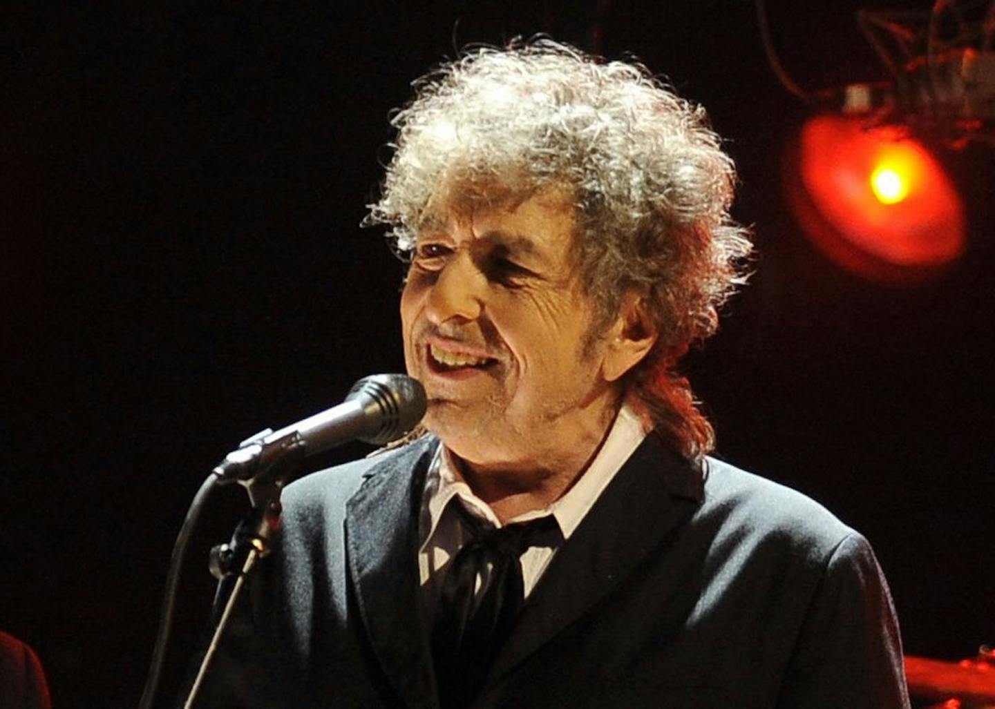 FILE - In this Jan. 12, 2012, file photo, Bob Dylan performs in Los Angeles. The electric guitar that Bob Dylan plugged in at the Newport Folk Festival in 1965 may be the most historic instrument in rock music, and it's back at the festival this weekend.