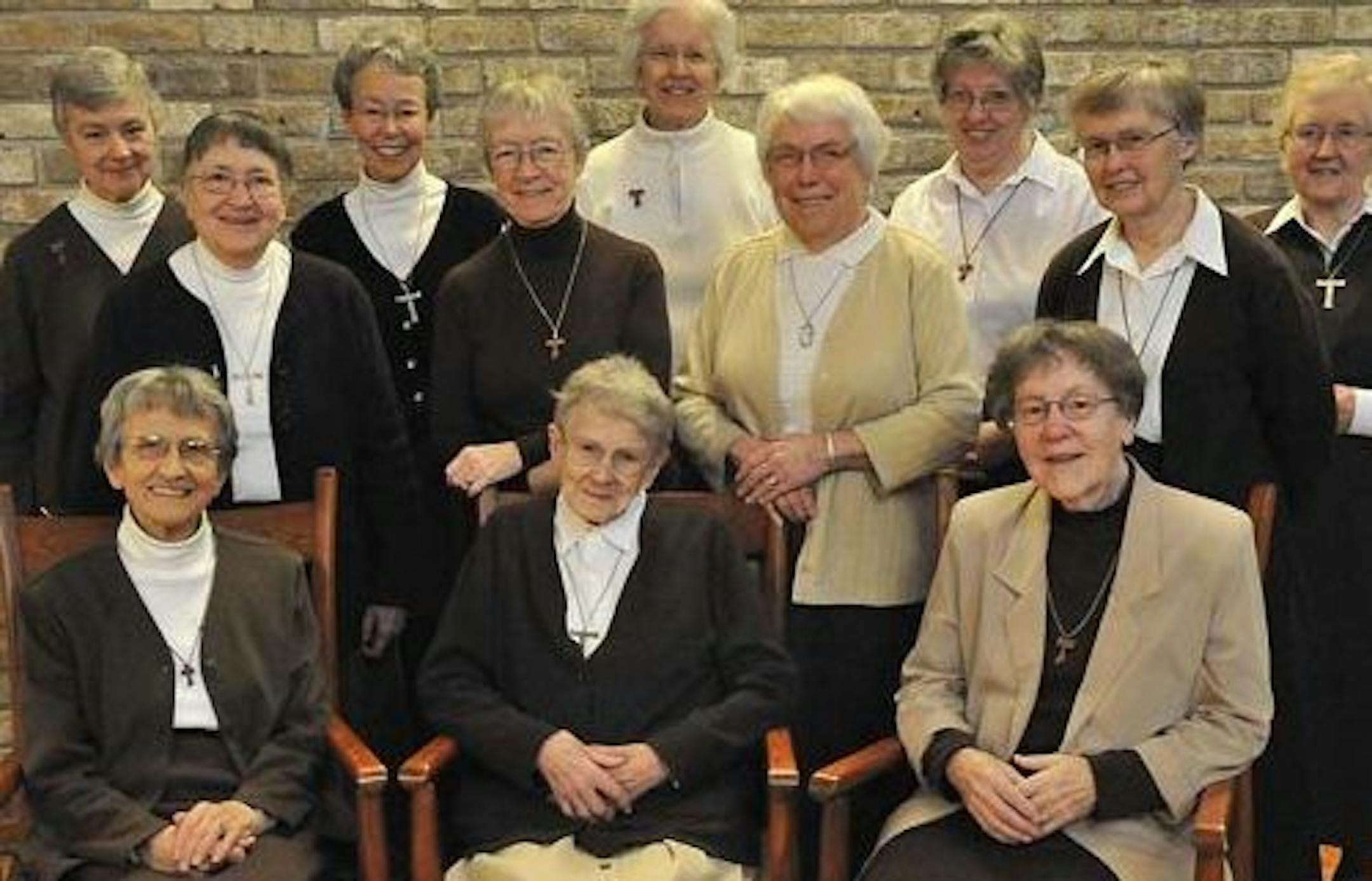 Sister Anne Condon (bottom row, center) helped found the Minneapolis community of Poor Clares, 62 years ago.