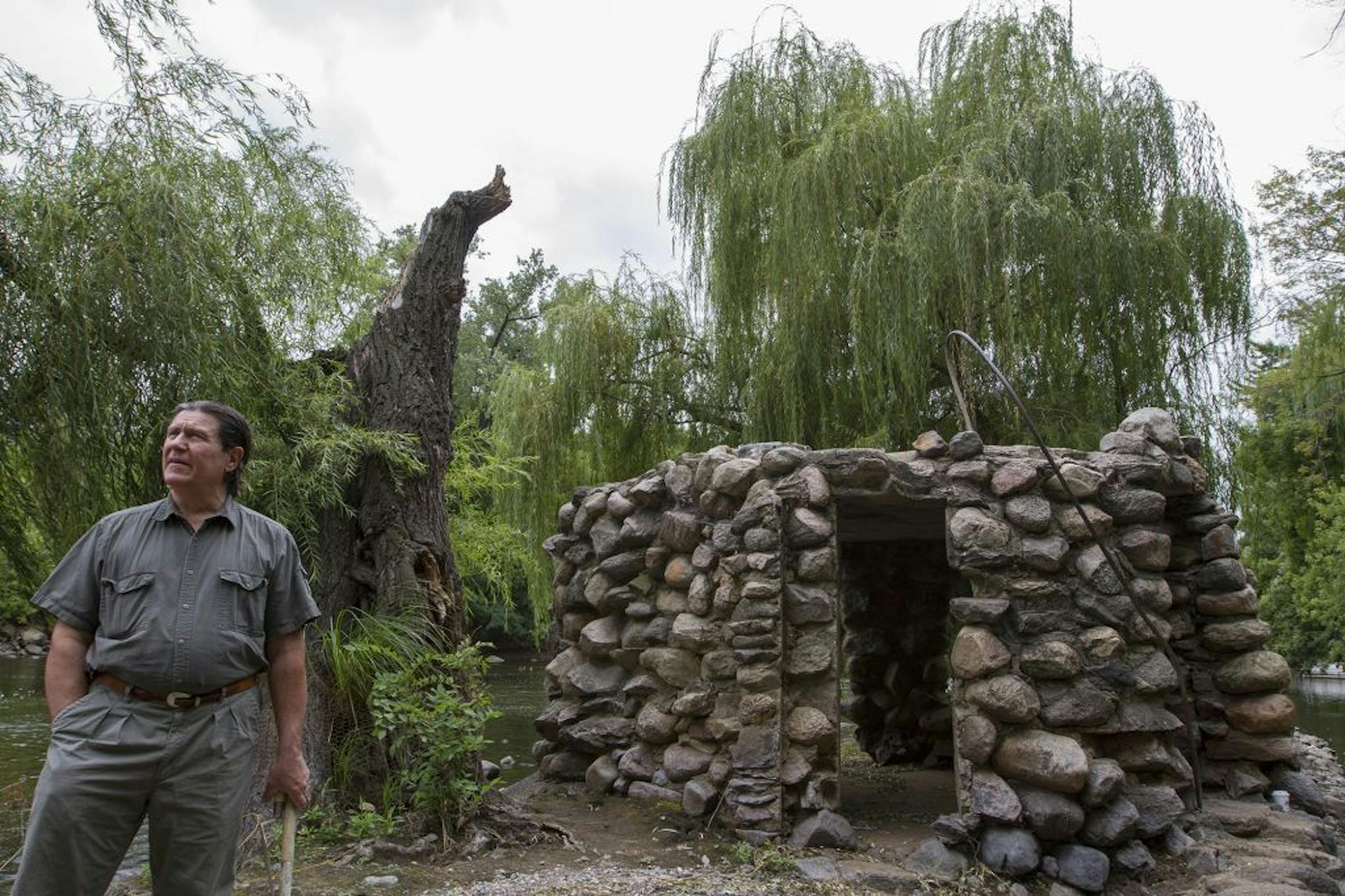 Paul Pierce (cq/source), former Anoka city council member, local historian, and lifetime resident, takes a walk around the stone house of Thaddeus Giddings in downtown Anoka, Minn. Pierce is working to have the structure and the surrounding area cleaned up and made into a garden folley.