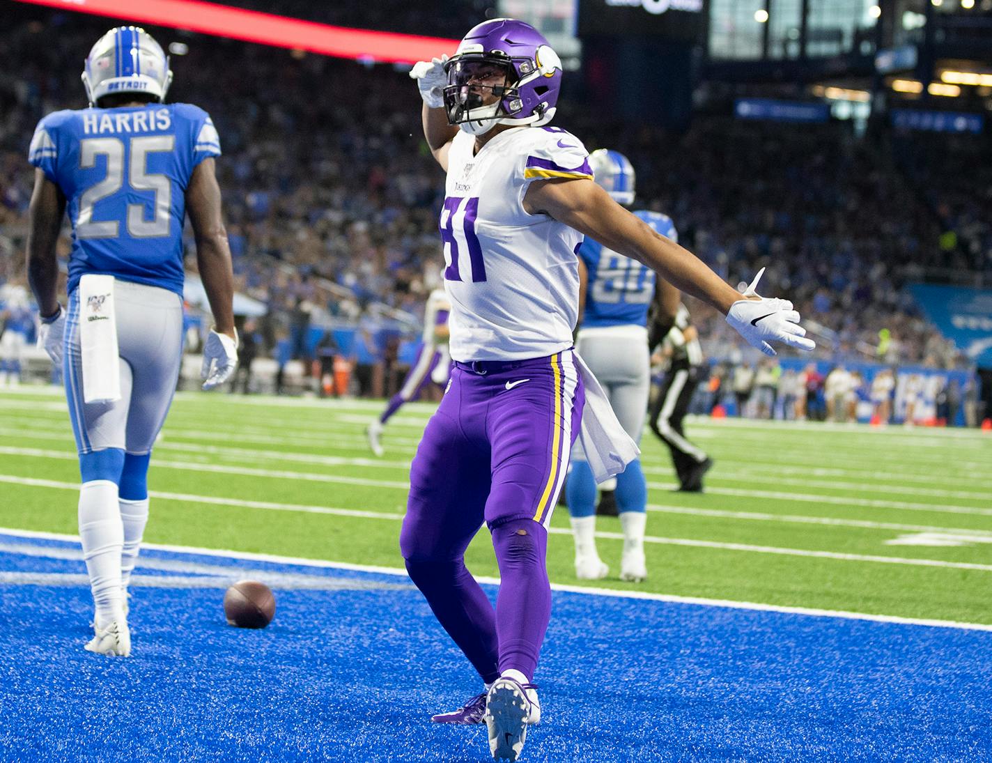 Vikings wide receiver Bisi Johnson celebrated his second quarter touchdown at Ford Field against the Lions.