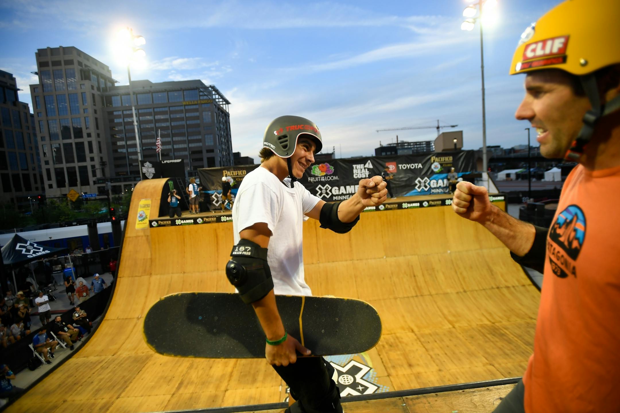Eduardo Damestoy bumped fists with veteran skateboarder Andy Macdonald after Damestoy's second run Wednesday night in the first heat of vert qualifiers.