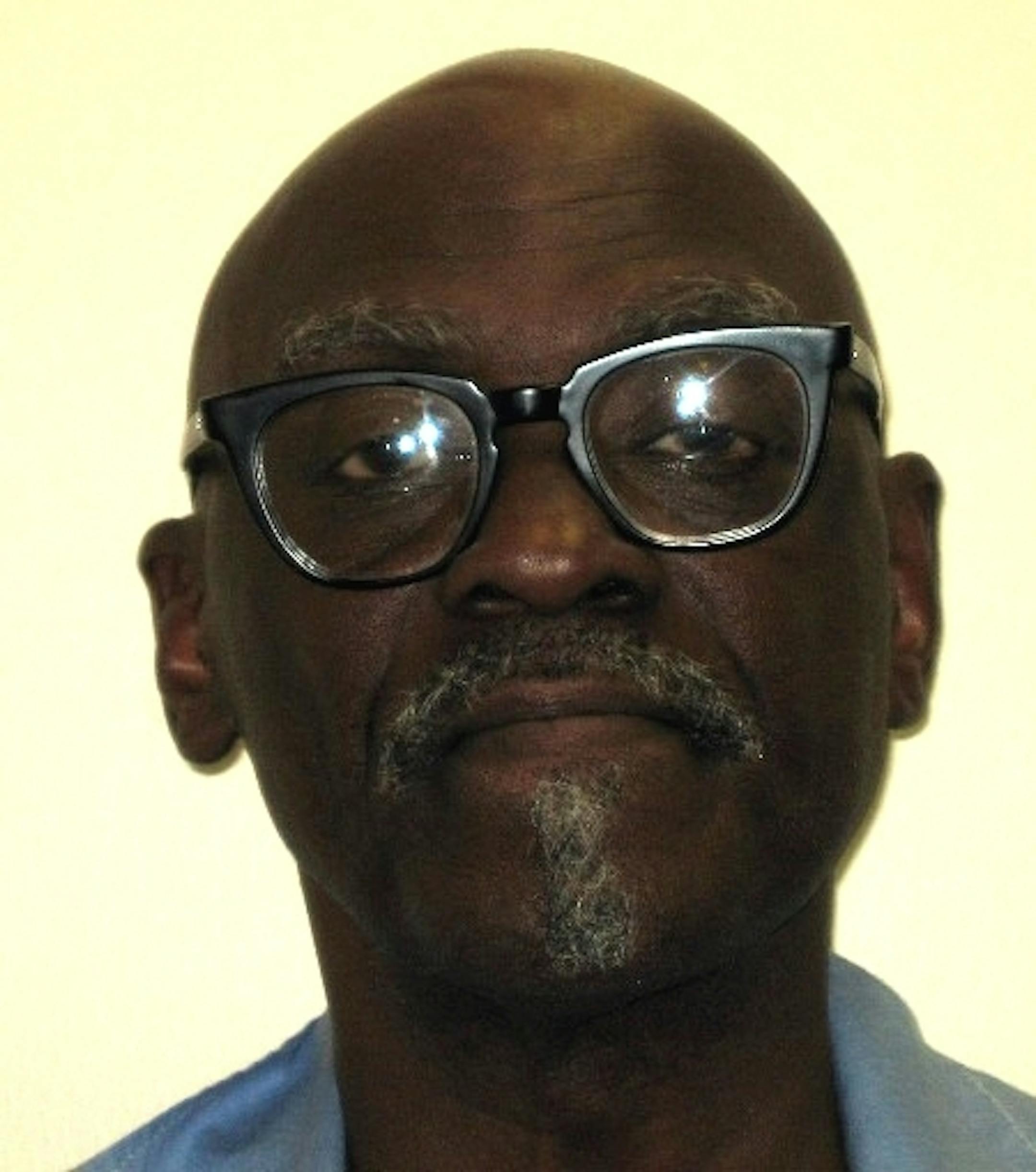 Gregory L. Smith, 59, is a Level 3 predatory offender who shed his court-imposed electronic monitoring bracelet. He is shown here with reading glasses, which he sometimes wears.