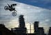 Jarryd McNeil clears the pipe during the Moto X Step Up event in front of U.S. Bank Stadium in Minneapolis on the first day of X Games competition.