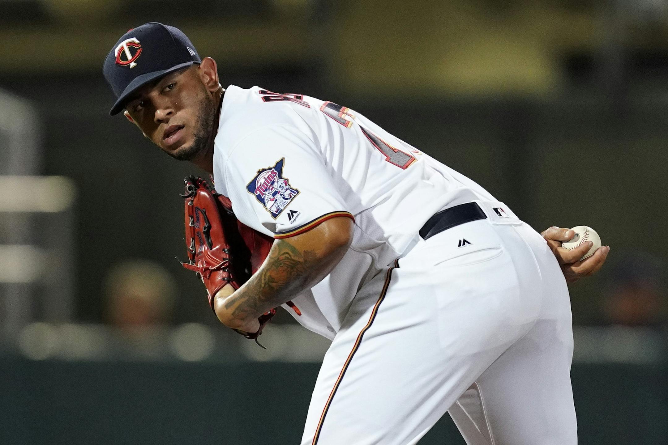 Minnesota Twins pitcher Fernando Romero (77) checked on a runner at first during Saturday's game. ] ANTHONY SOUFFLE • anthony.souffle@startribune.com The Minnesota Twins played the Tampa Bay Rays in their first home Spring Training game Saturday, Feb. 23, 2019 at The CenturyLink Sports Complex's Hammond Stadium in Fort Myers, Fla.