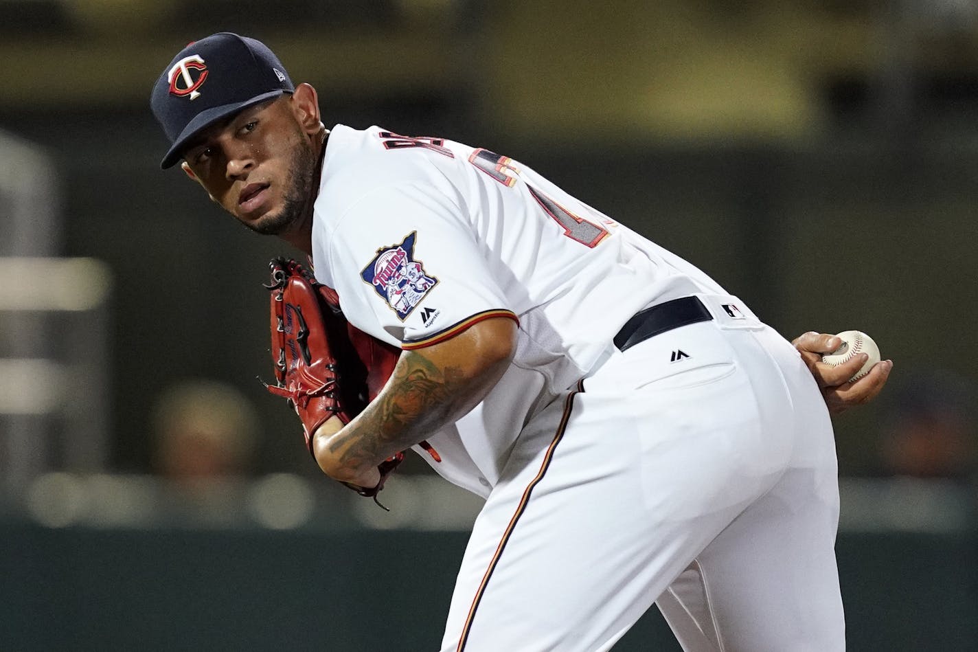 Minnesota Twins pitcher Fernando Romero (77) checked on a runner at first during Saturday's game. ] ANTHONY SOUFFLE &#x2022; anthony.souffle@startribune.com The Minnesota Twins played the Tampa Bay Rays in their first home Spring Training game Saturday, Feb. 23, 2019 at The CenturyLink Sports Complex's Hammond Stadium in Fort Myers, Fla.