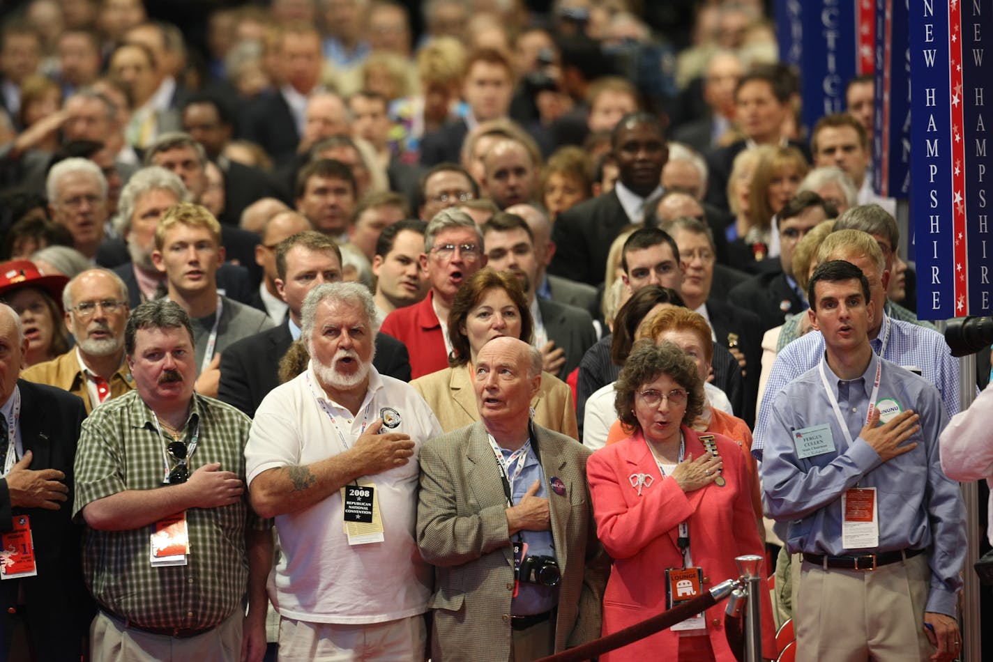 Delegates say the Pledge of Allegiance at the start of Monday's session.