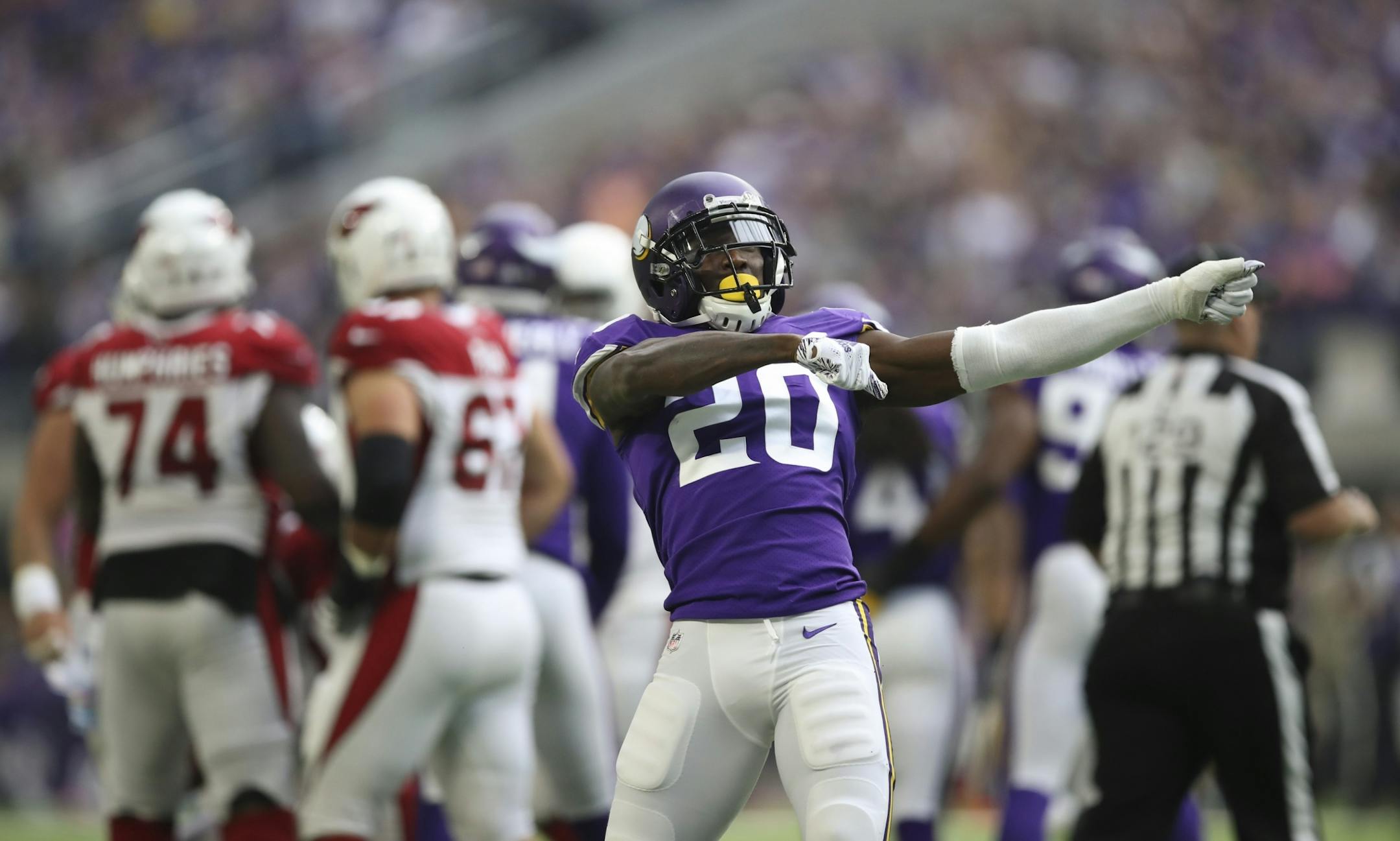 Minnesota Vikings cornerback Mackensie Alexander (20) celebrated after his first quarter sack of Arizona Cardinals quarterback Josh Rosen (3) for an eight yard loss.