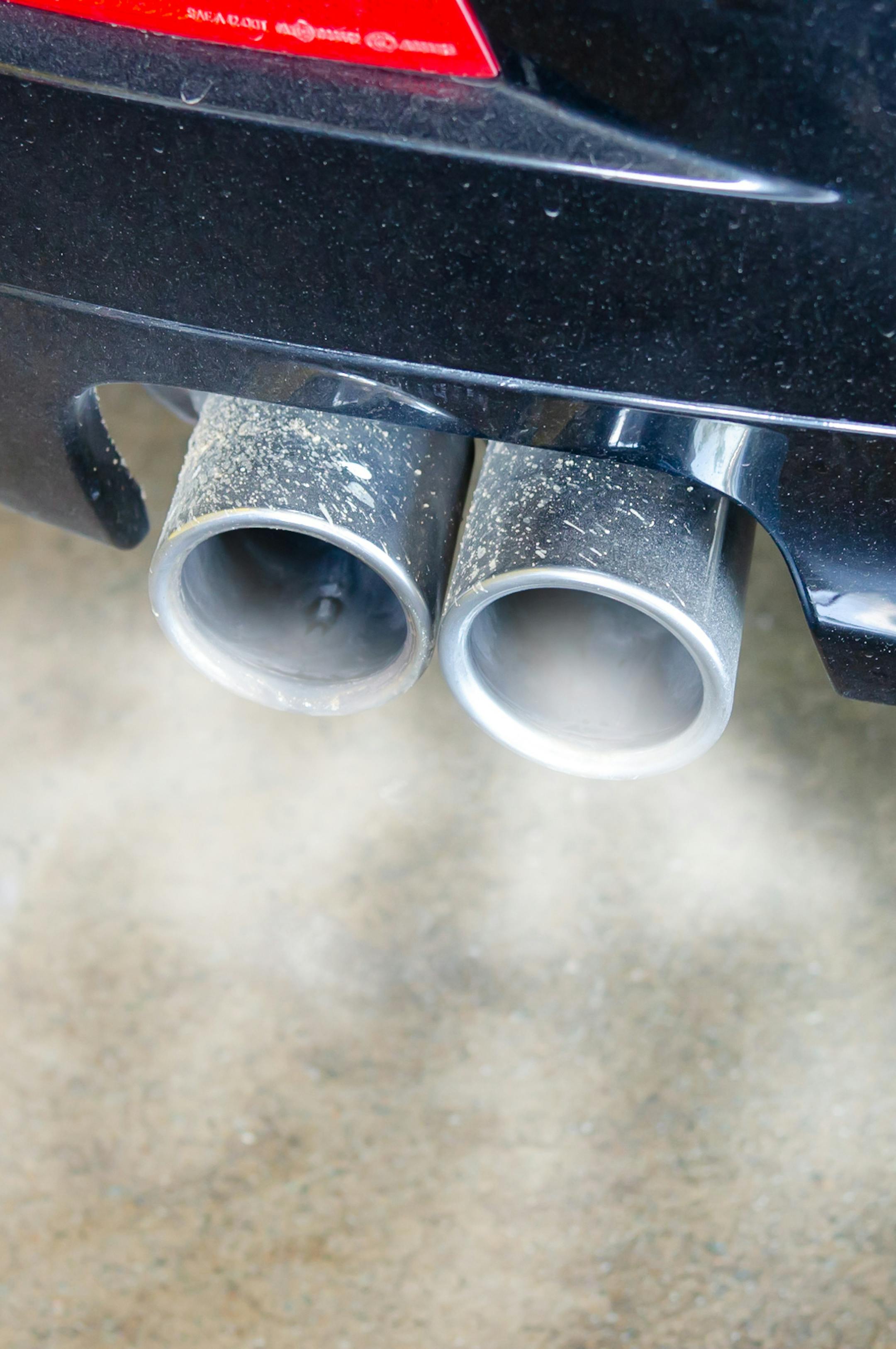 Car exhaust while leaving a smoke.