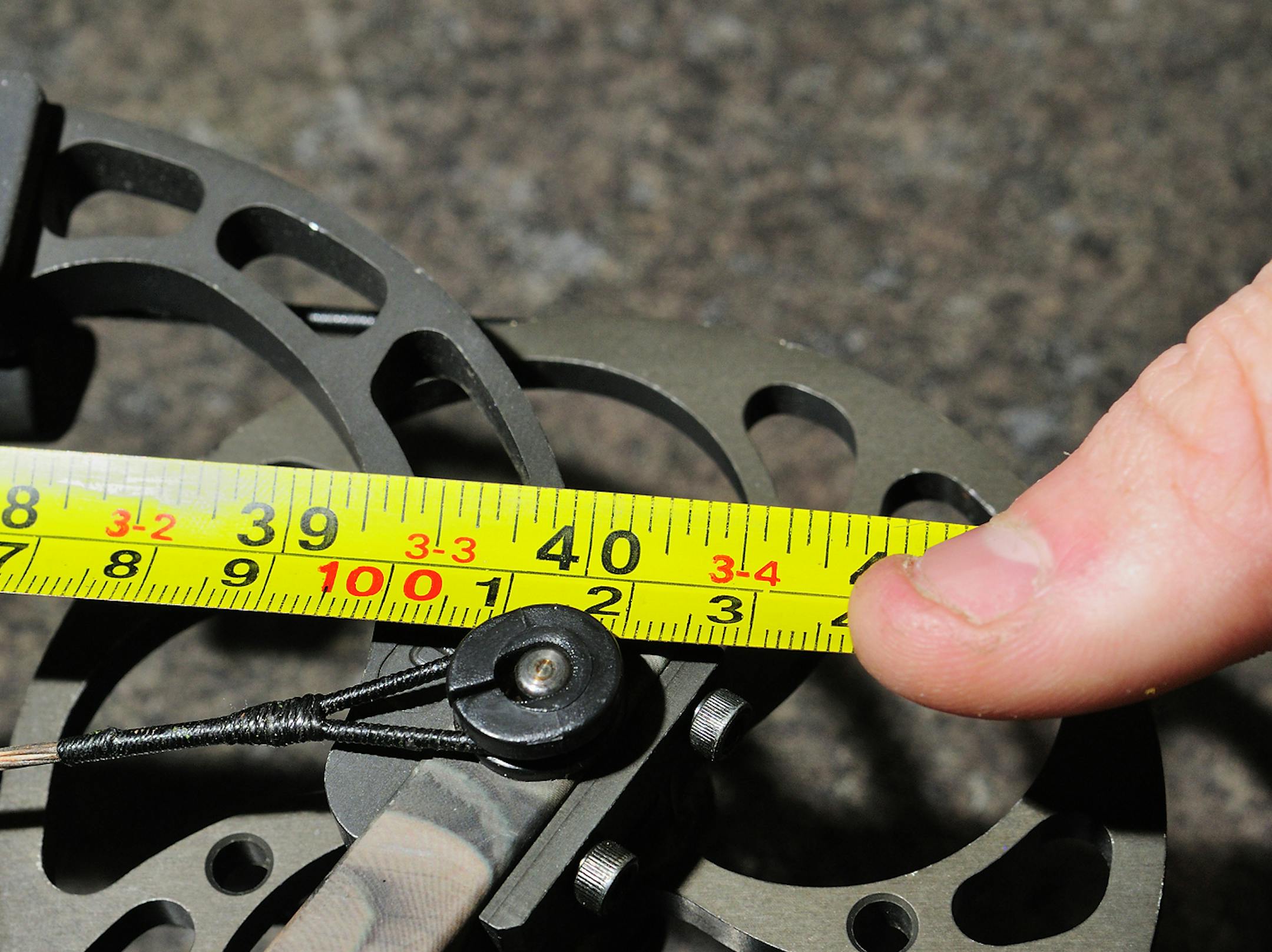 Proper axel-to-axel distance varies from bow to bow. Manufacturer specification for the bow above is 40 inches.