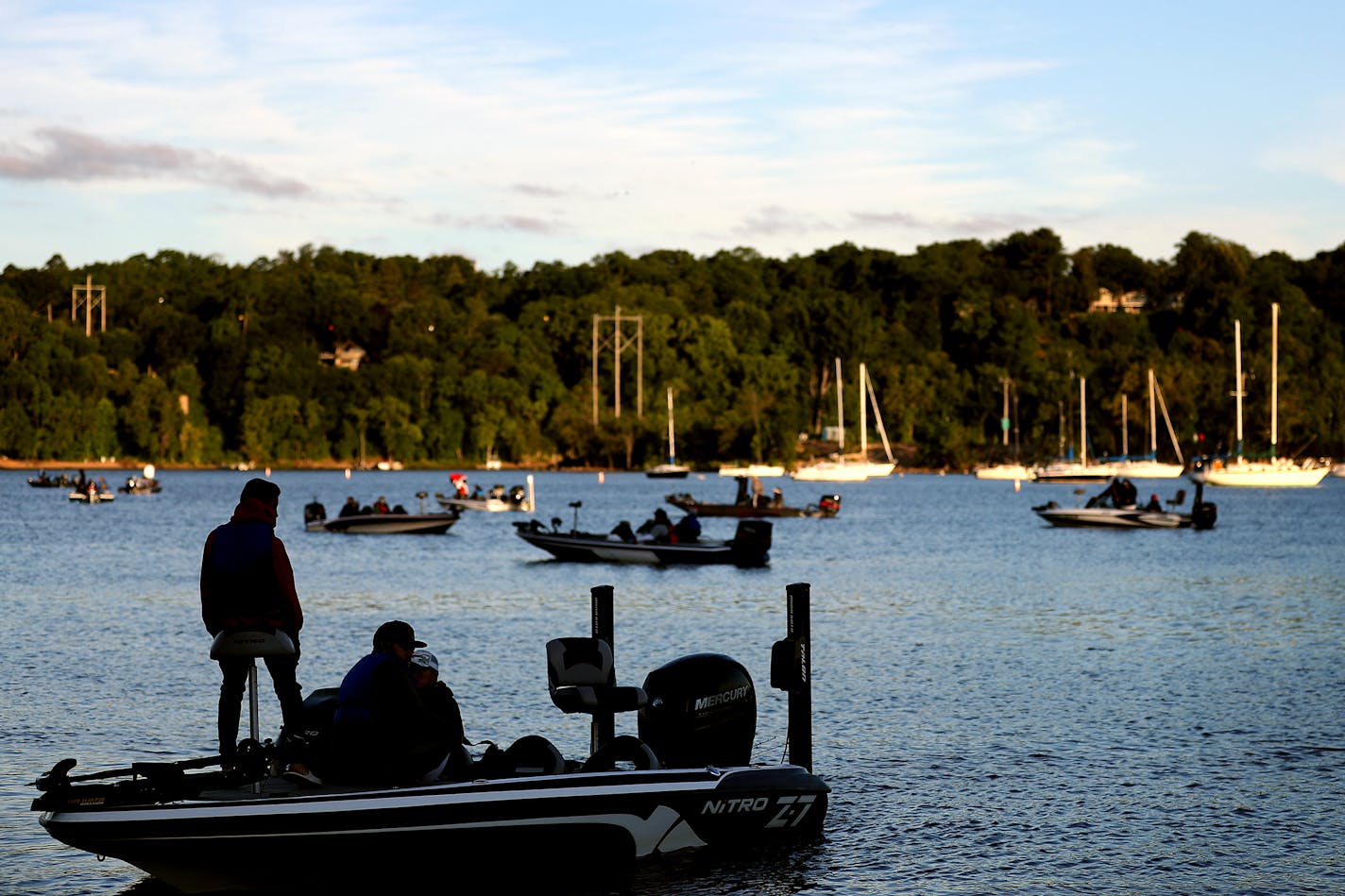 Fishermen competed in the Hmong Bass Fishing Tournament on the St. Croix River. Organizers of the long-held event canceled it this year. That&#x2019;s the exception, though.