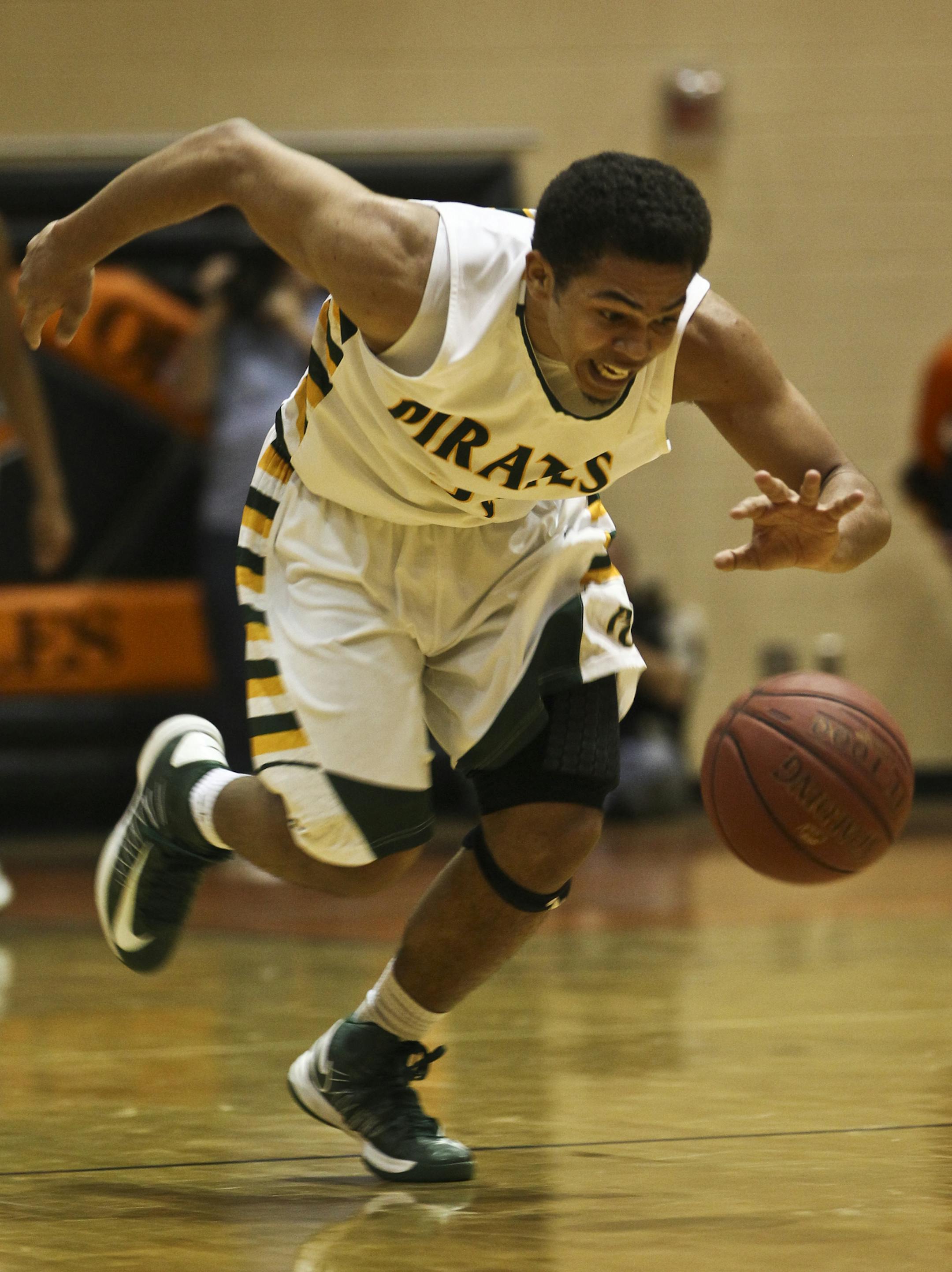Park Center's Quinton Hooker broke free with the ball at half court during the second half of a basketball game between Osseo anf Park Center at Osseo High School in Osseo, Minn. on Tuesday, February 5, 2013. ] (RENEE JONES SCHNEIDER reneejones@startribune.com)