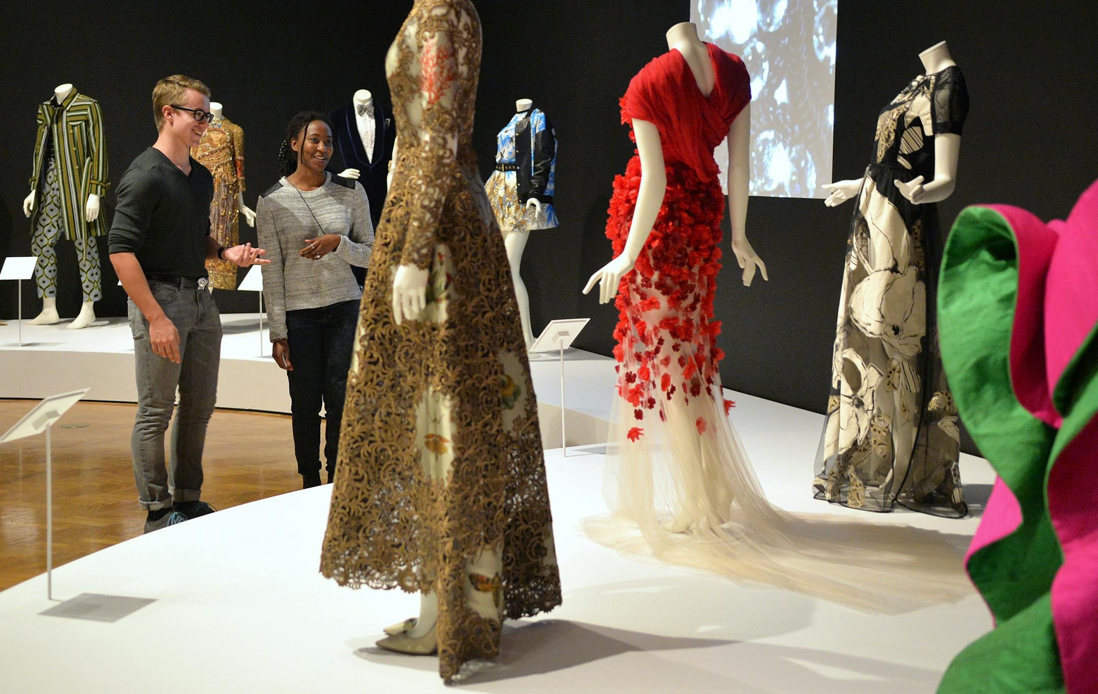 Nico Mercadal and Chase Jalivay peruse the latest exhibition visiting the Minneapolis Institute of Arts, "Italian Style: Fashion Since 1945."