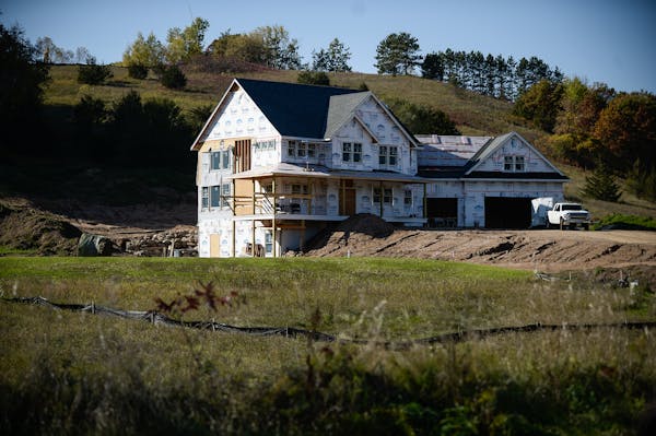 A home is under construction in Birch Park on Friday afternoon. Homebuilding in St. Croix County, Wis., once the state's fastest-growing county, conti