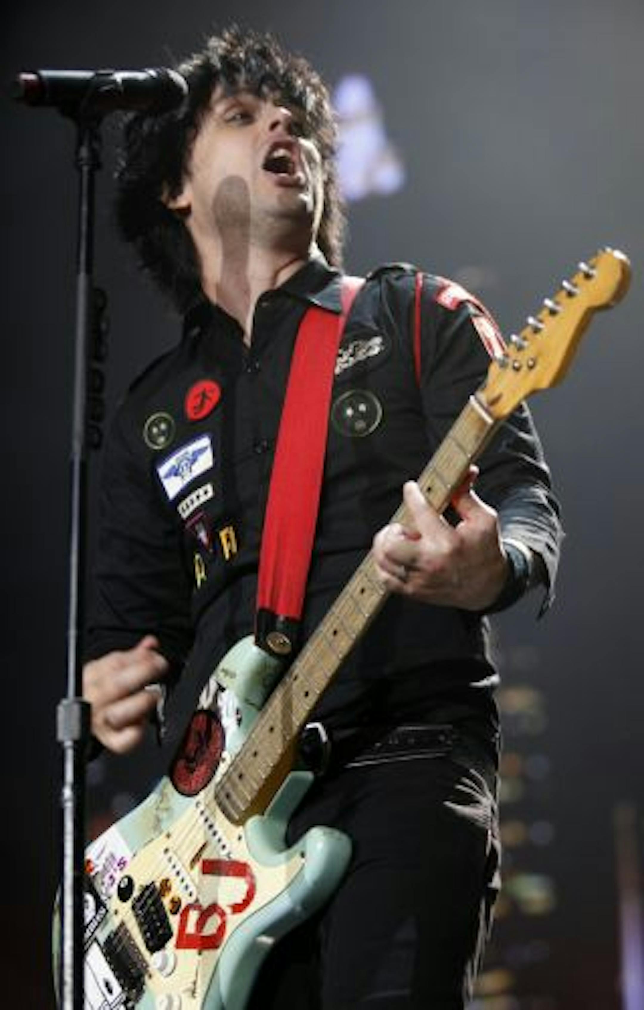 Billie Joe Armstrong, lead singer of the band Green Day, performs Saturday evening at the Target Center in Minneapolis.