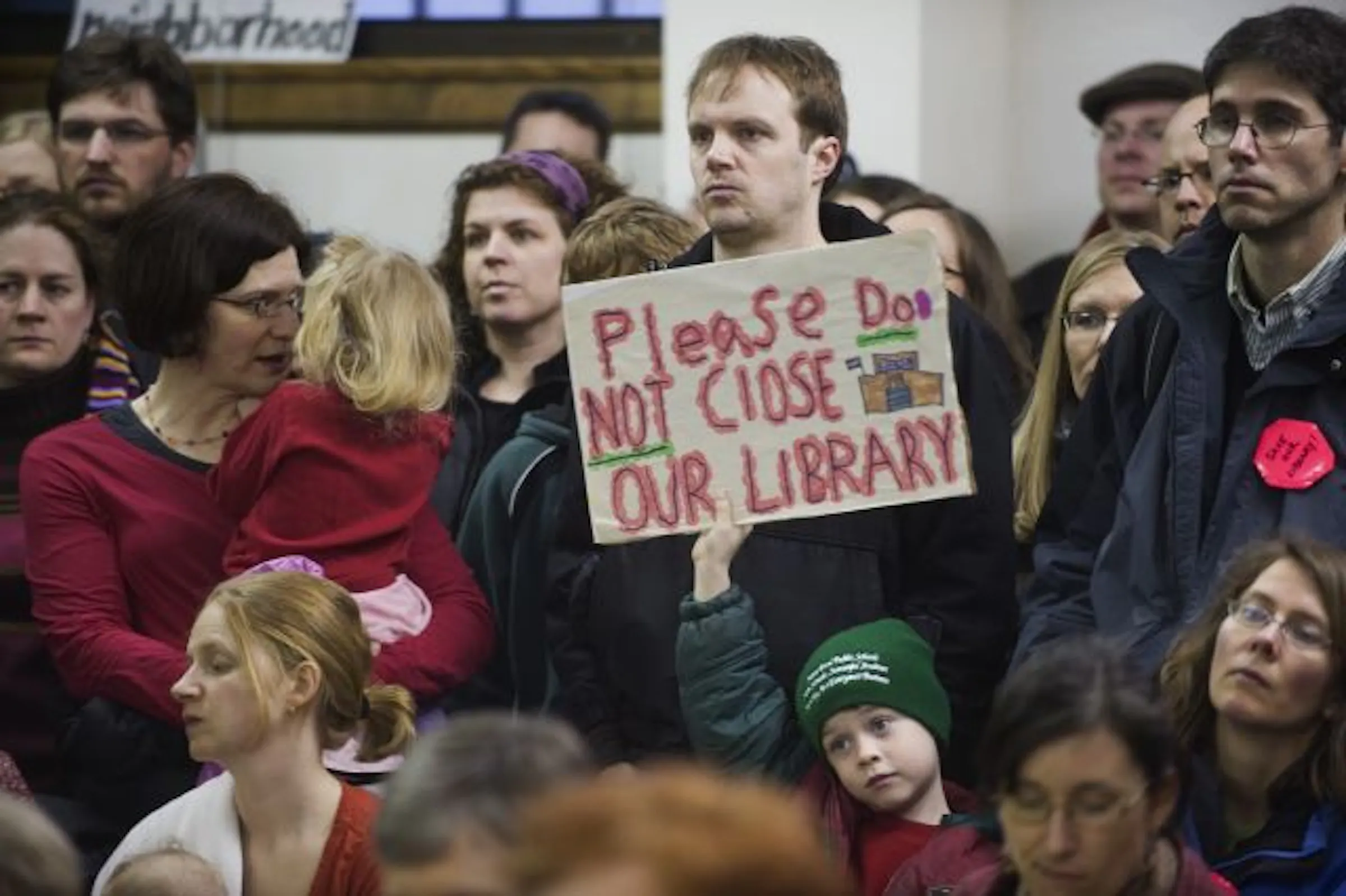 Neighbors turn out to keep their library from closing