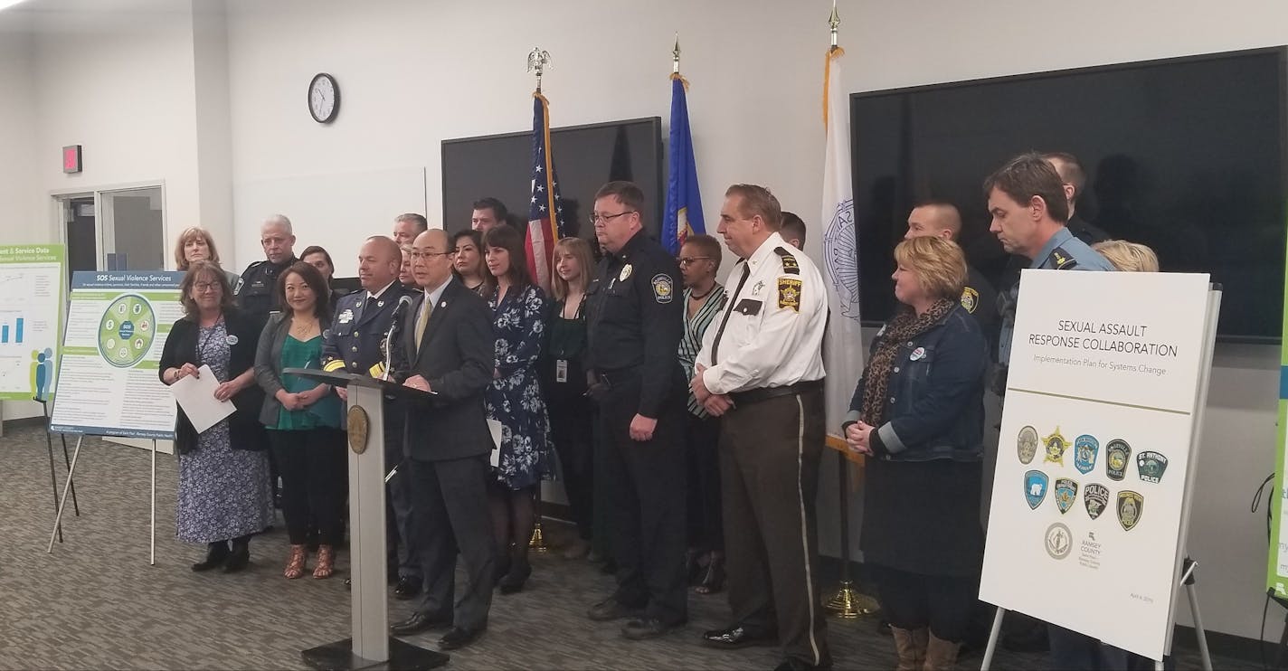 Ramsey County Attorney John Choi and law enforcement leaders sign the "Sexual Assault Response Collaboration" on Thursday. Choi said it is a promise to better investigate sex crimes and to improve the treatment of victims. Shannon Prather, Star Tribune