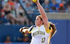 Michigan starter Haylie Wagner pitches against Florida during the fourth inning of Game 2 of the finals in the NCAA softball Women's College World Ser