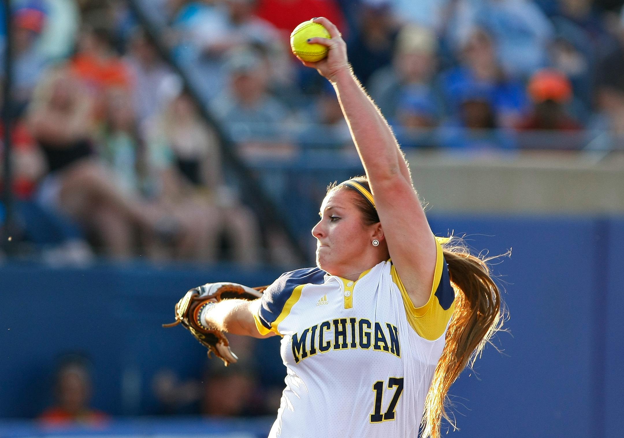 Michigan starter Haylie Wagner pitches against Florida during the fourth inning of Game 2 of the finals in the NCAA softball Women's College World Series, Tuesday, June 2, 2015, in Oklahoma City. (AP Photo/Alonzo Adams)