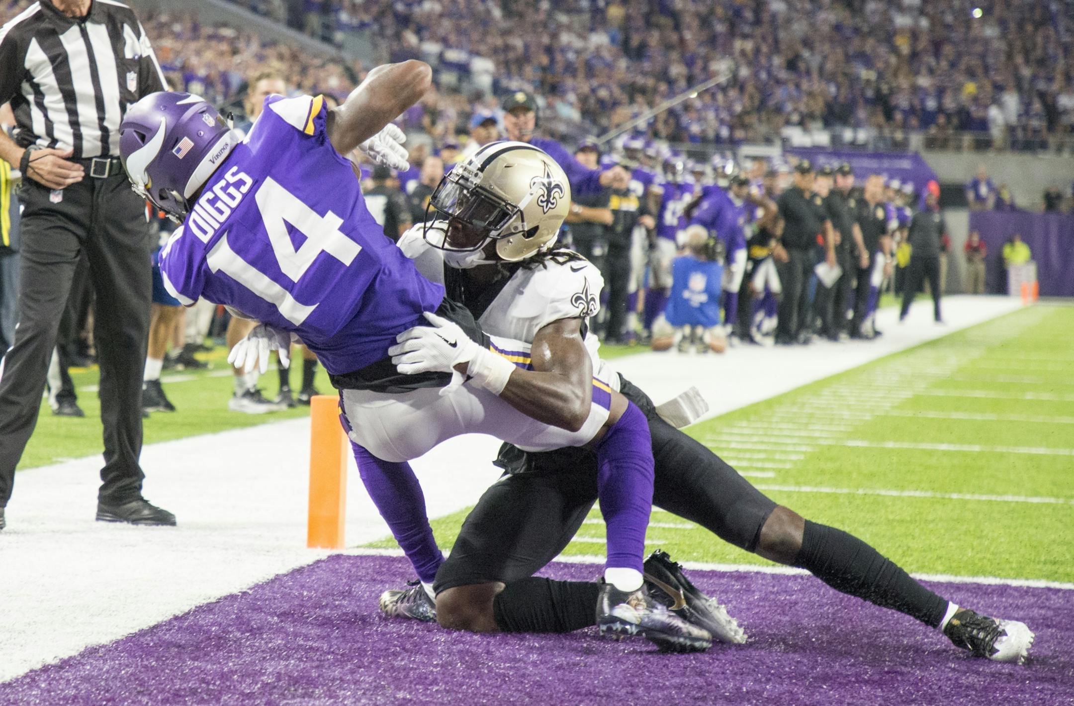 Minnesota Vikings wide receiver Stefon Diggs (14) caught a second quarter touch down over New Orleans Saints cornerback De'Vante Harris (21) at U.S. Bank Stadium Monday September 11,2017 in Minneapolis, MN.