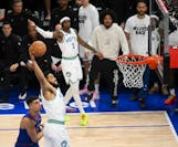 Karl-Anthony Towns dunks the ball during the first quarter of Game 6.

  ] AARON LAVINSKY • aaron.lavinsky@startribune.com