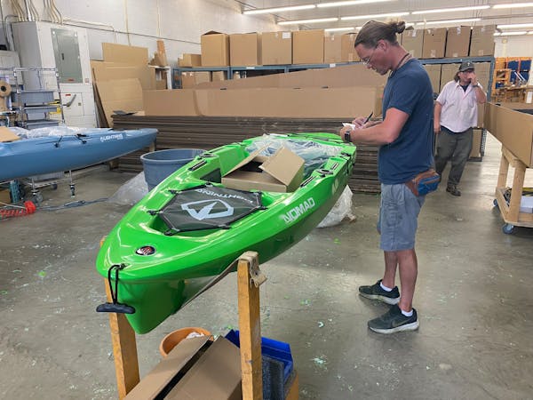 Jason Branch of Lightning Kayaks finished assembly of the company’s latest crowdfunded kayak, Lightning Nomad.