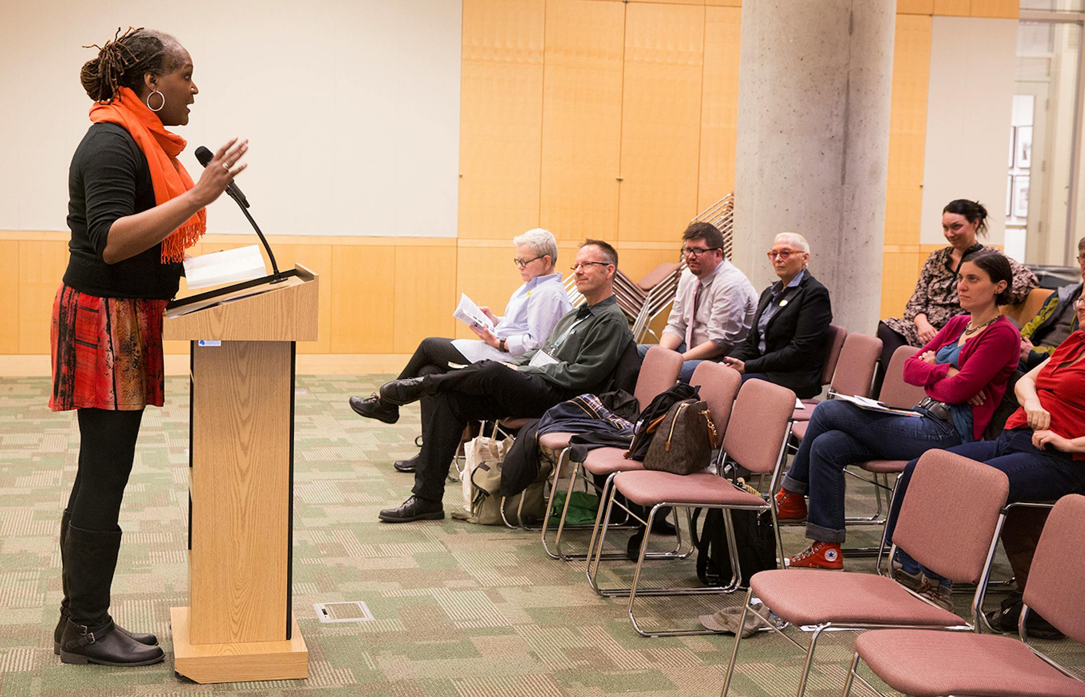 Local writer Andrea Jenkins does a reading of her work at Queer Voices, an event she co-curated to bring together LGBT poets and writers as part of the Association of Writers & Writing Conference, at the Minneapolis Central Library in downtown Minneapolis on Thursday, April 9, 2015. ] LEILA NAVIDI leila.navidi@startribune.com /