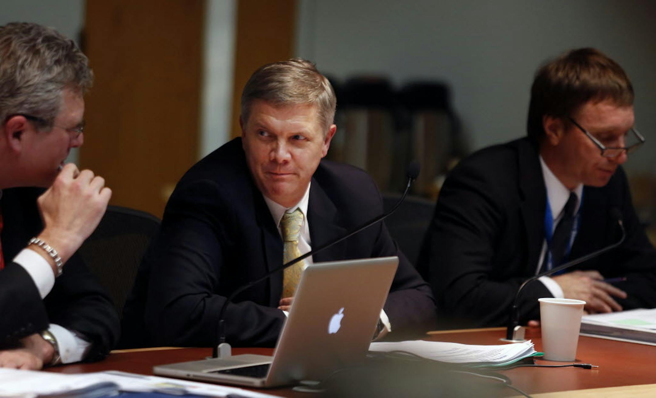 At the Eisenhower Community Center on 12/20/12, the Hopkins school board including superintendent John Schultz,center, voted not to allow the 400 homes in Edina's Parkwood Knolls neighborhood to leave Hopkins Schools due to loss of tax revenue.