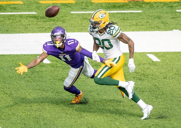 Vikings wide receiver Tajae Sharpe eyed up the ball but was unable to make the catch pressured by Kevin King during the third quarter