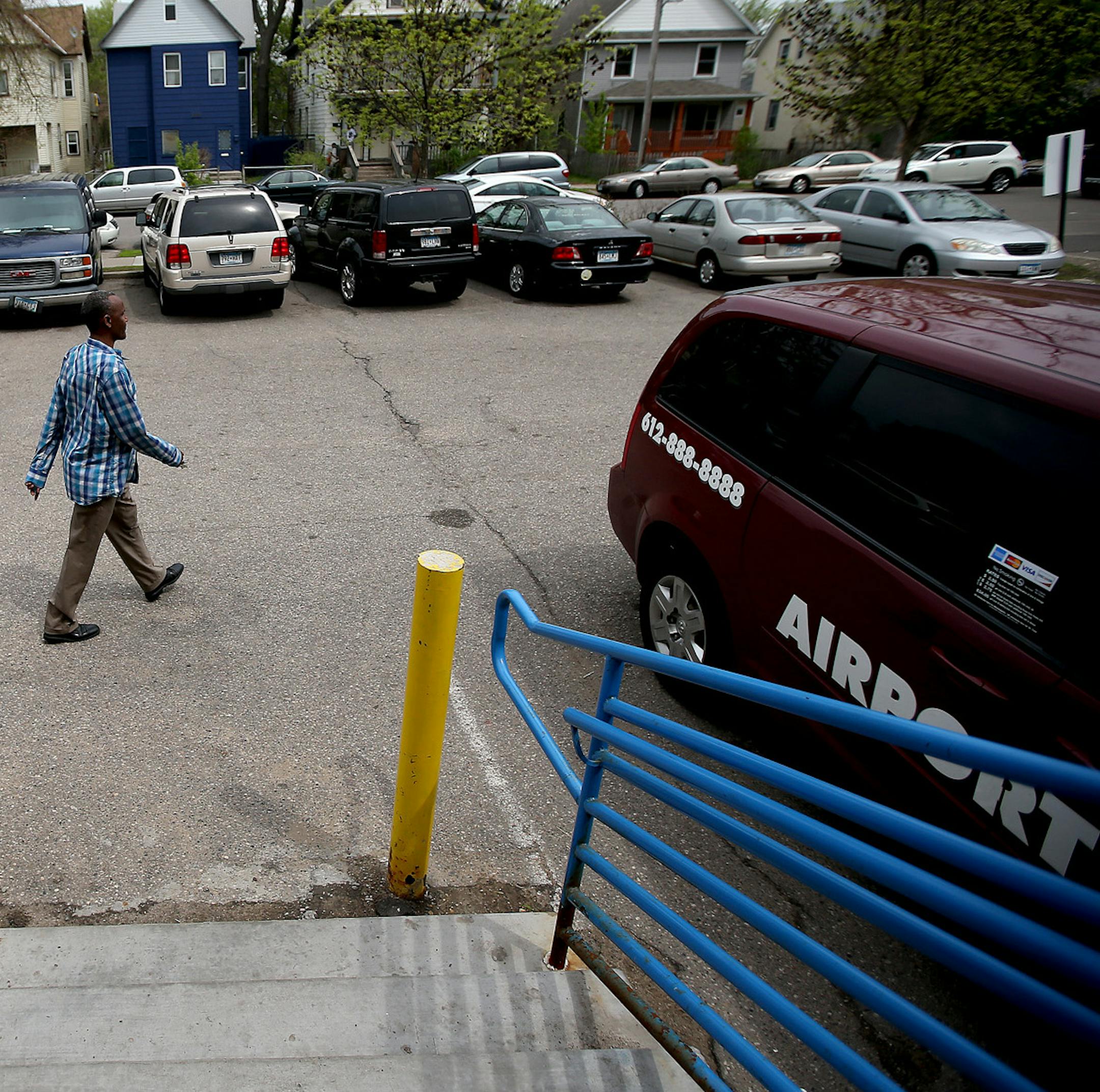 “We don’t get them from the Mall of America,” Halima Ahmed said. Below: A man made his way to his car in the mall’s small lot. The Planning Commission did approve a rezoning plan Monday that would allow for extra parking spaces; meanwhile, the mall’s owners are considering installing a pay booth at the entrance.