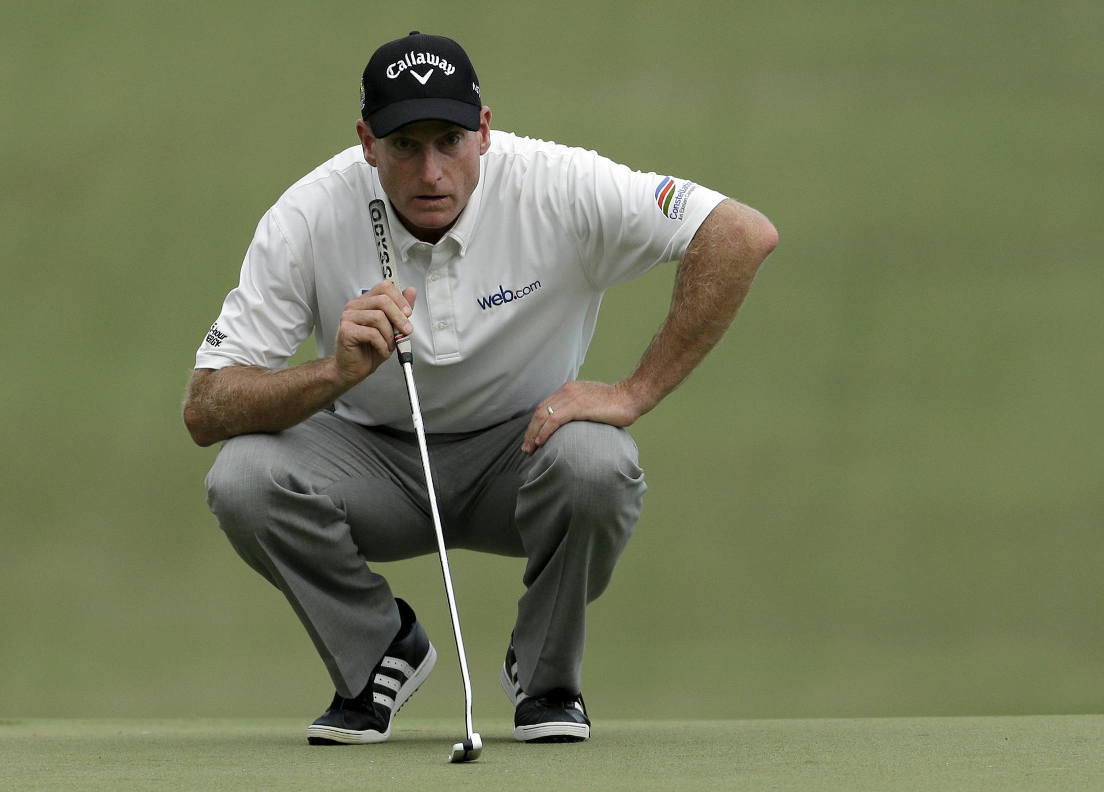Jim Furyk lines up a putt on the 18th hole during the second round of the Wyndham Championship golf tournament in Greensboro, N.C., Friday, Aug. 19, 2016. (AP Photo/Chuck Burton)