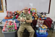 Luke Keller surrounded by dragons, monkeys and the other handmade creations of the Teddy Bear Project. For years, the men incarcerated at the federal 