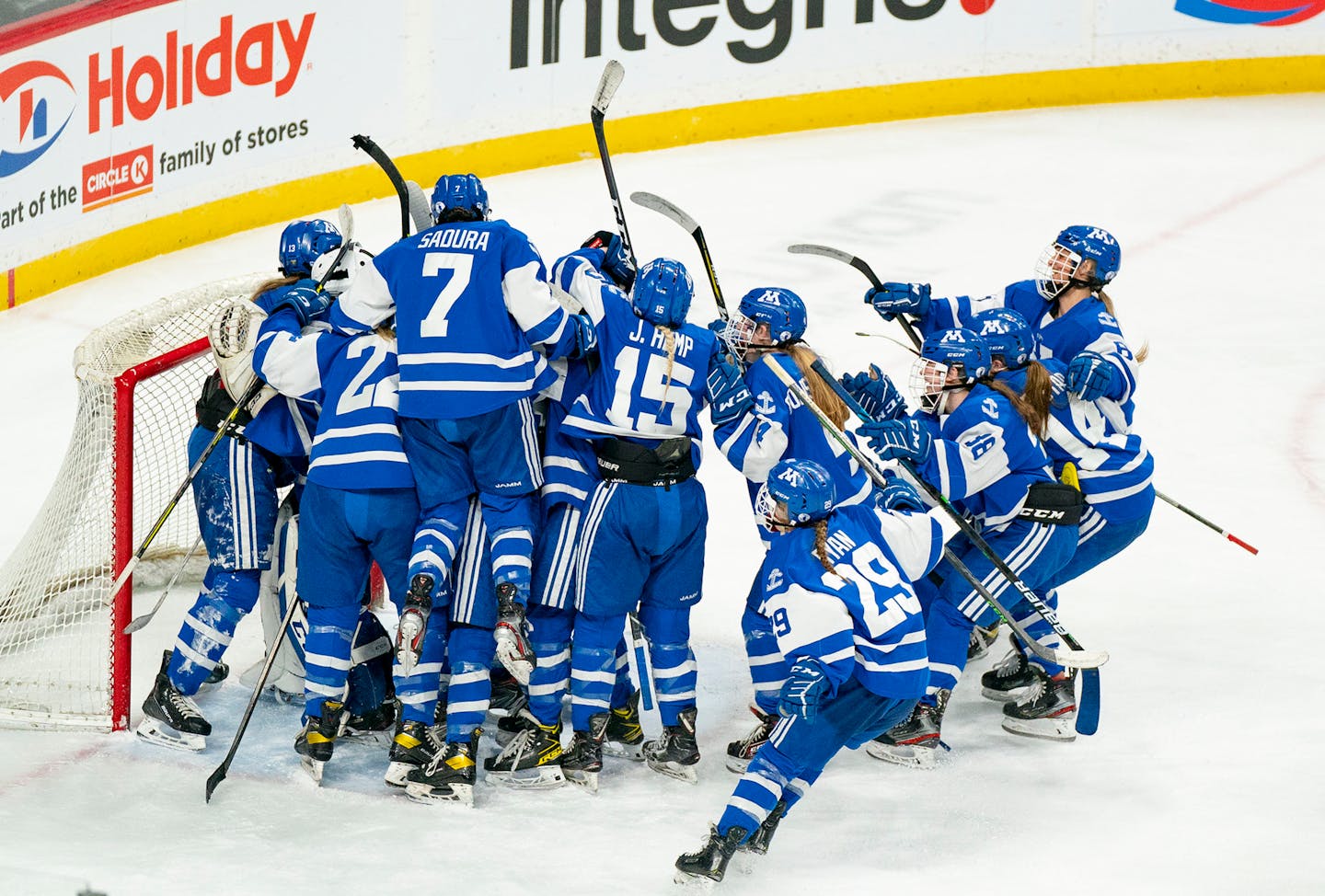 Minnetonka players celebrate after defeating Edina 2-1 in the MSHSL state tournament class 2A girl's hockey semi-finals Friday, Feb. 25, 2022 at Xcel Energy Center in St. Paul, Minn. ]