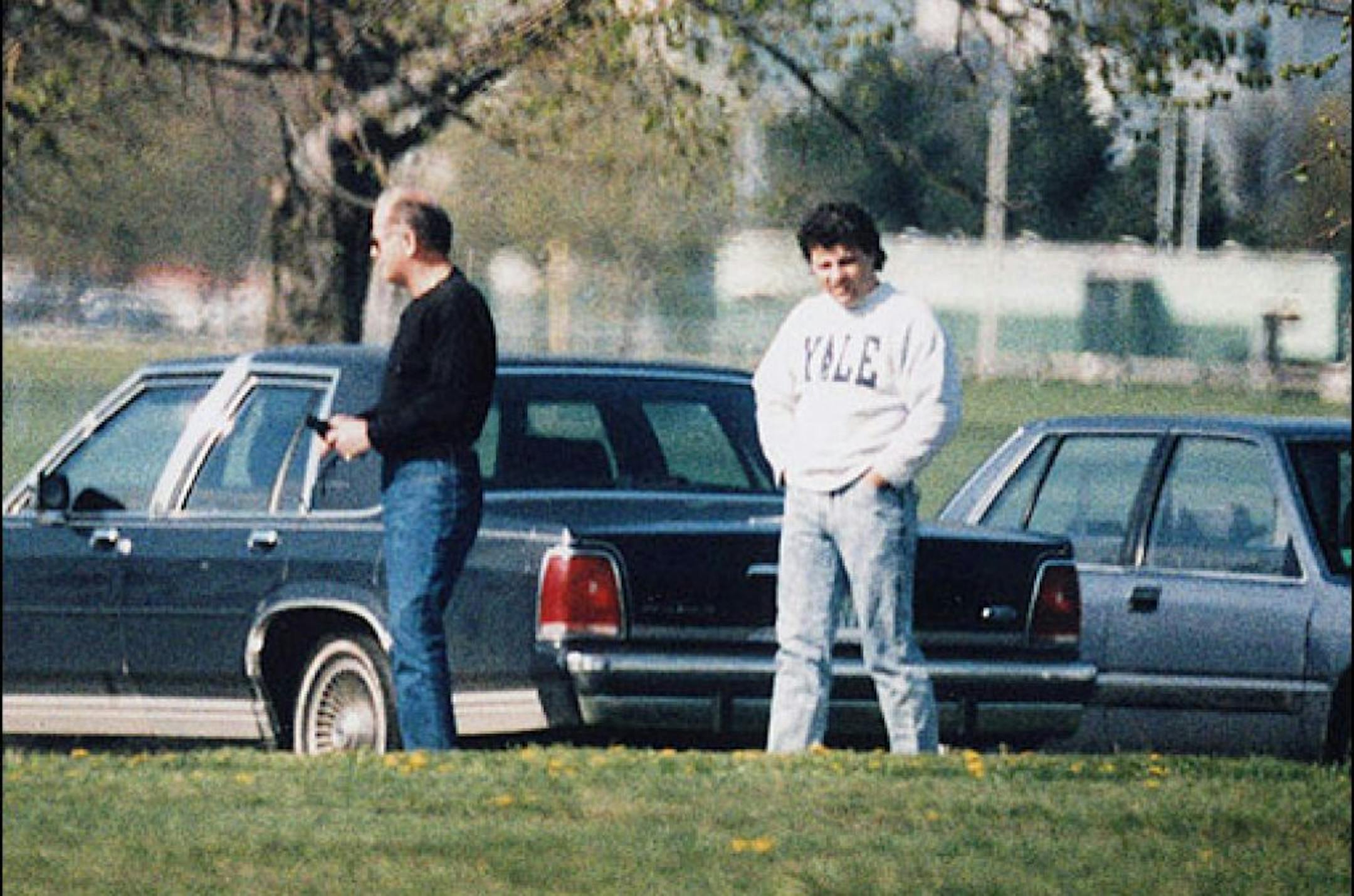 This undated surveillance photo released Monday, July 8, 2013 by the U.S. Attorney's office at federal court in Boston shows James "Whitey" Bulger, left, with his former right hand man, Kevin Weeks. Weeks took the witness stand Monday at Bulger's racketeering trial and described a double slaying, multiple extortions and drug dealing.