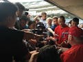 Reporters, including many from Japan, surrounded Angels manager Mike Scioscia on Friday after Japanese rookie star Shohei Ohtani went on the disabled 
