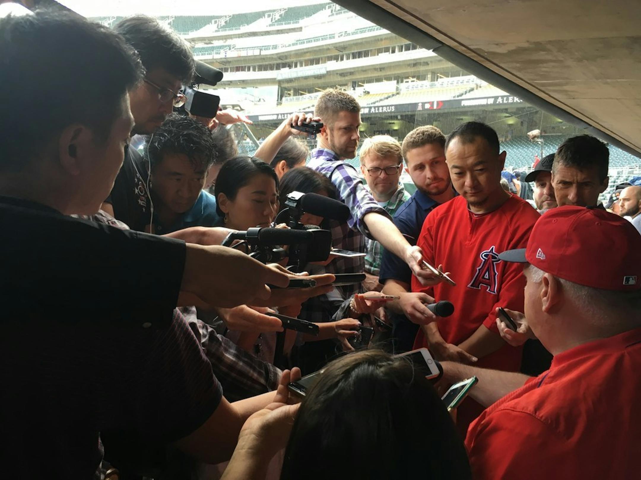 Reporters, including many from Japan, surrounded Angels manager Mike Scioscia on Friday after Japanese rookie star Shohei Ohtani went on the disabled list