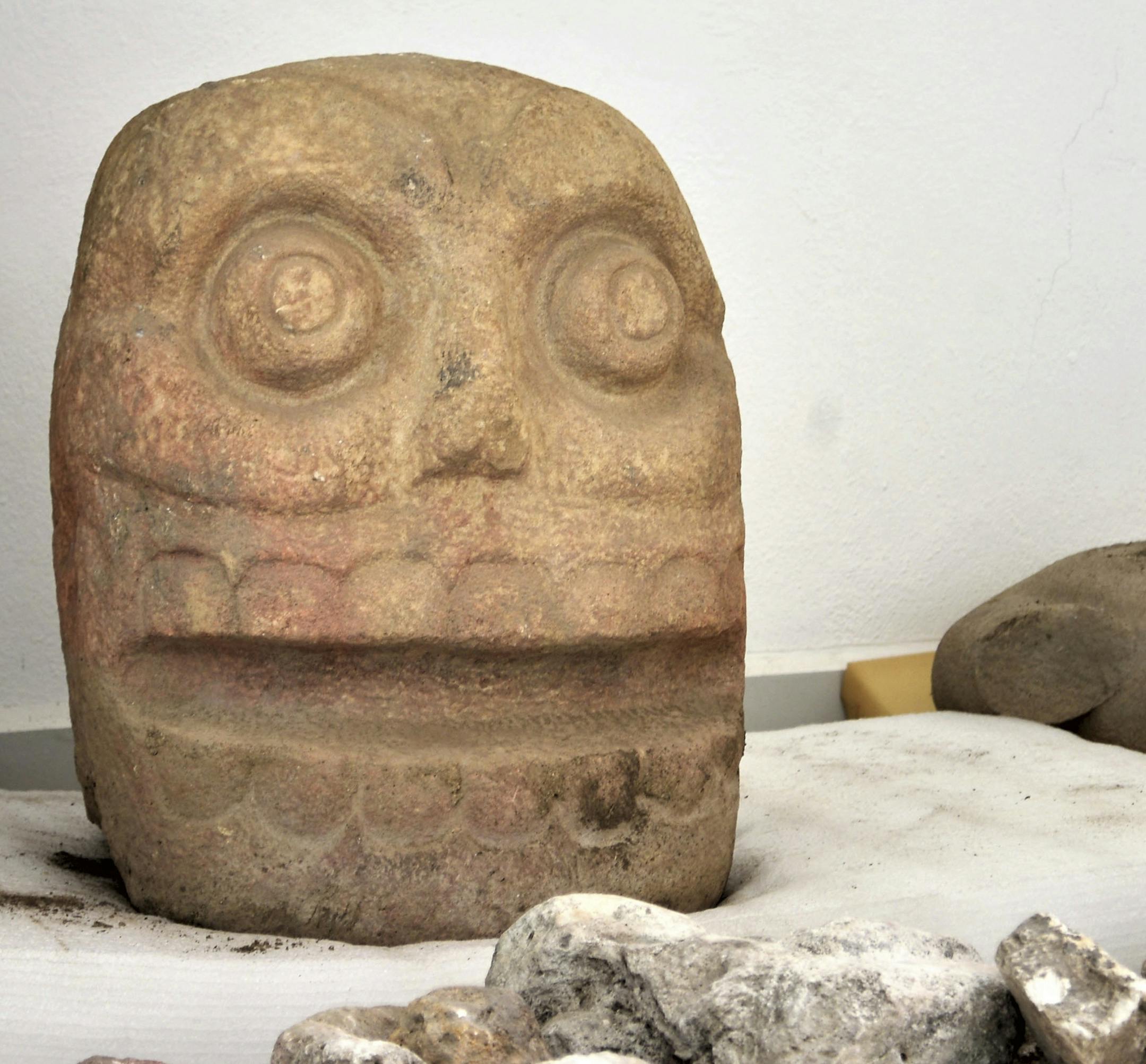In an undated image proved by Mexico’s National Institute of Anthropology and History, a sculpture depicting Xipe Tótec, a pre-Columbian god known as the Flayed Lord. Archaeologists in Mexicos’ Puebla state say they have found the first temple dedicated to the Flayed Lord, an important god in the Aztec Empire whose worshipers were said to wear the skin of sacrificial victims. (Meliton Tapia/National Institute of Anthropology and History via The New York Times) -- NO SALES; FOR