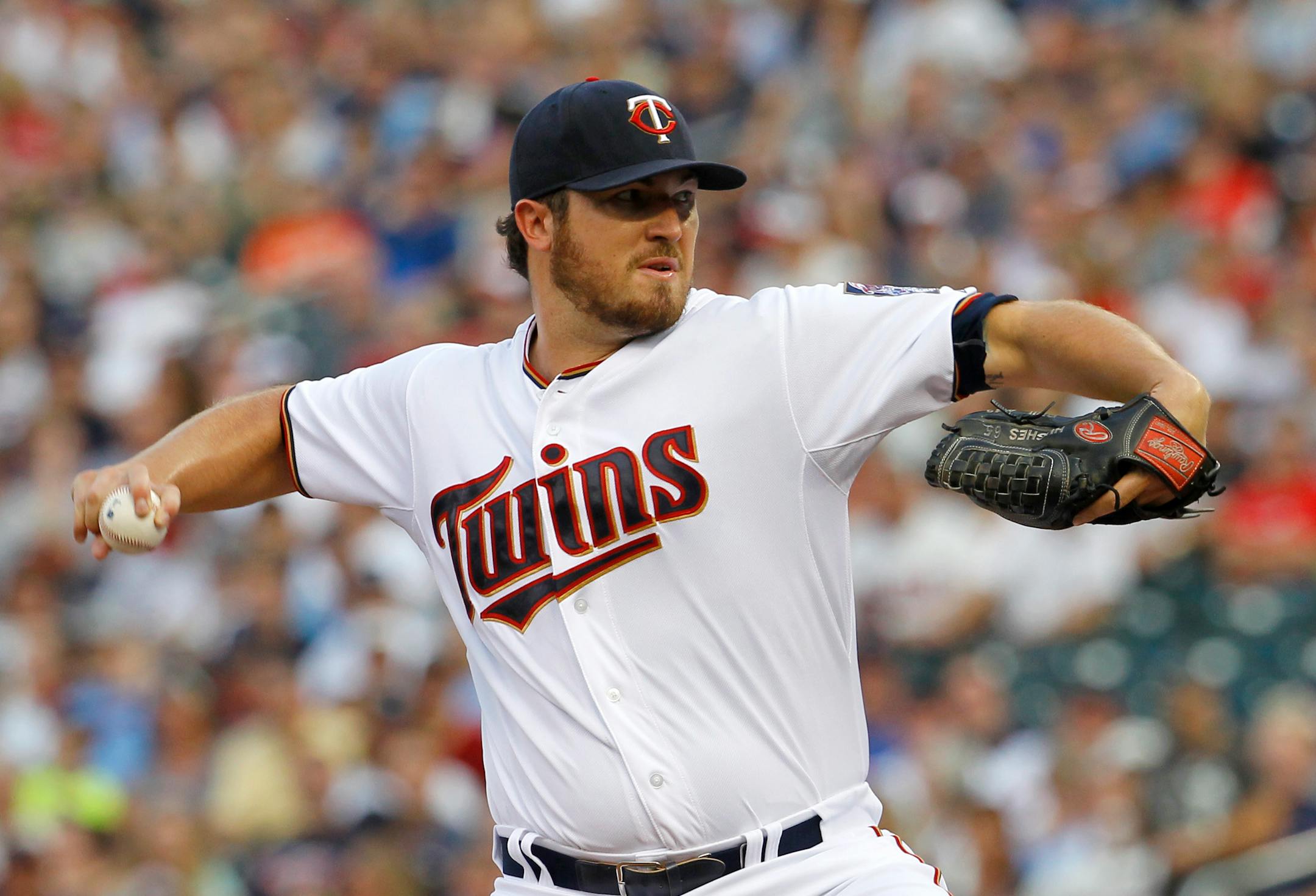 Twins starter Phil Hughes delivers in the first inning against the Yankees on Friday night at Target Field. Hughes pitched seven shutout innings, giving up seven hits, striking out three and walking none.