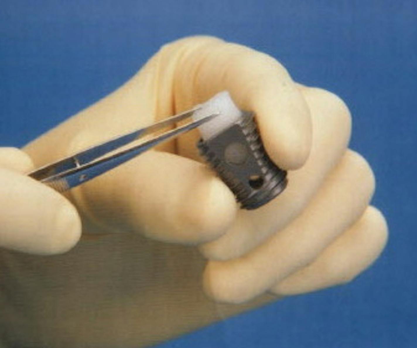 Medtronic Inc. has received FDA approval for its "InFuse" device, a genetically engineered bone-growth product used in spinal fusion surgery. Article ran Wed July 3, 2002, Star Tribune, page D1. Handout photo.