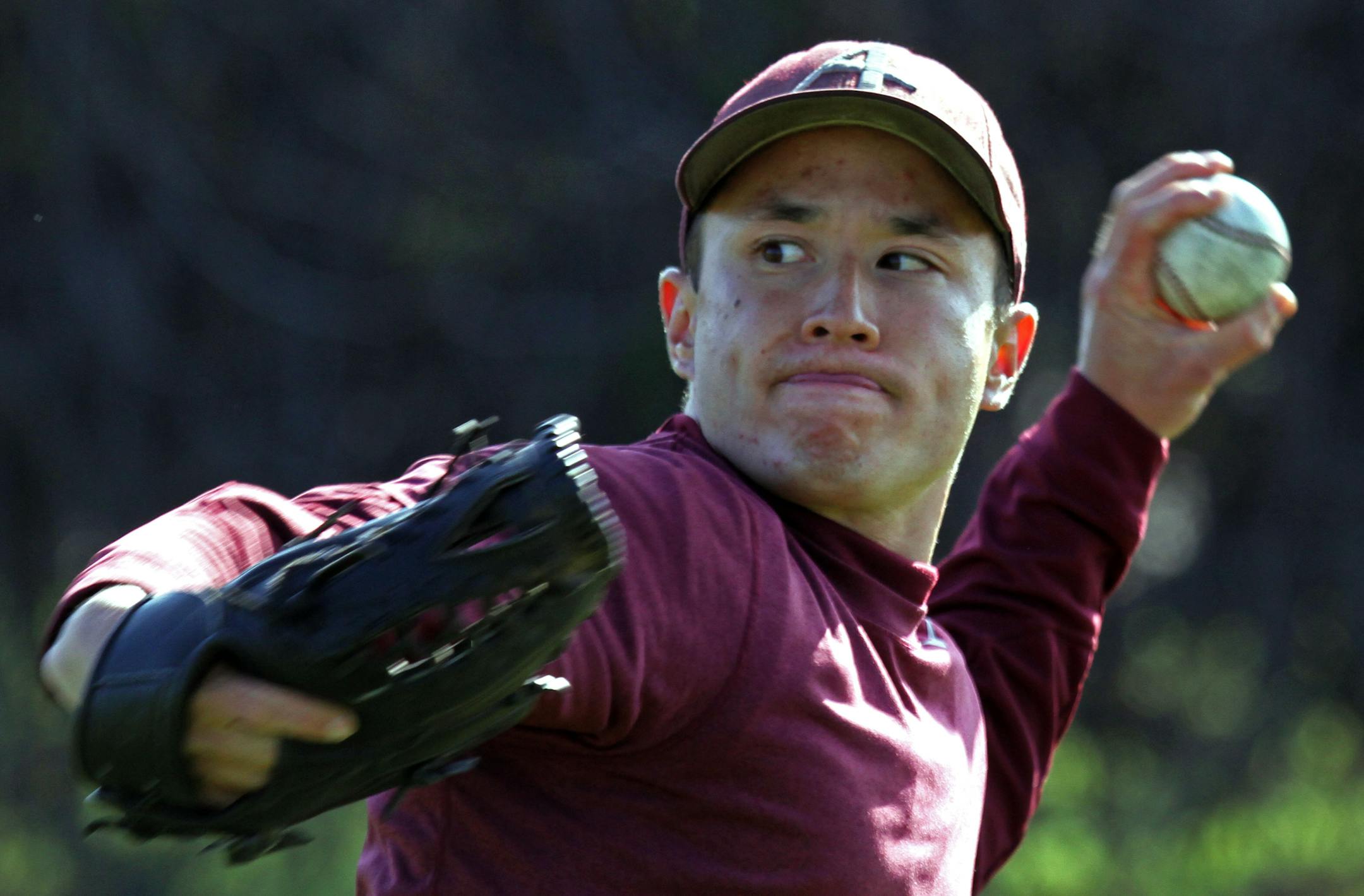 Augsburg Senior Relief Pitcher Jeff Boresz pitched during practice at Parade Stadium on 4/20/12.