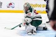 Wild goaltender Filip Gustavsson makes a glove save at Colorado on March 8, when he finished with 38 saves in a 2-1 overtime loss.