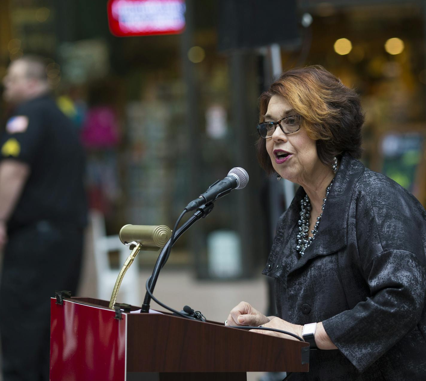 President and CEO of the Minneapolis Foundation Sandra Vargas spoke a a press conference as local muralist Shawn McCann painted a 3D street scene in the plaza at the IDC Center in downtown Minneapolis, Minn. to commemorate The Minneapolis Foundation's Centennial, on Monday, April 6, 2015. The interactive painting will be finished Tuesday afternoon and on display through Friday. ] RENEE JONES SCHNEIDER &#x2022; reneejones@startribune.com